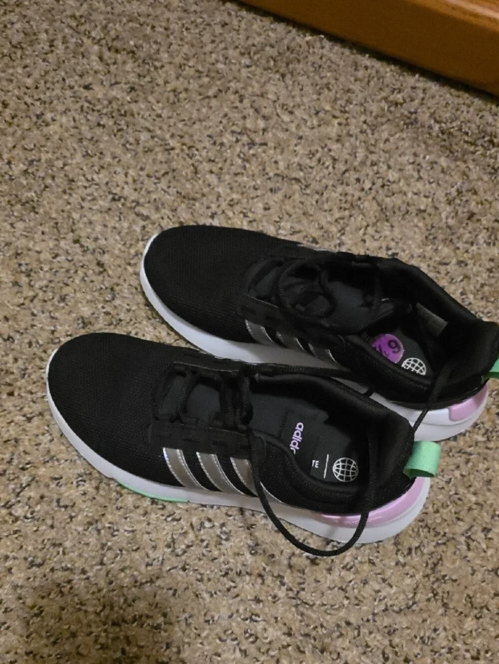 adidas Women’s Black Athletic Sneakers with Silver Stripes and Pastel Accents